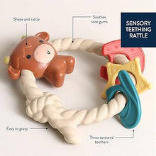 Itzy Ritzy Rattle™ Silicone Teether Rattles | Highland Cow