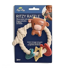 Itzy Ritzy Rattle™ Silicone Teether Rattles | Highland Cow
